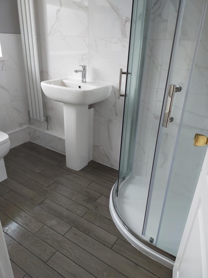 Modern bathroom renovation by BBS Wales